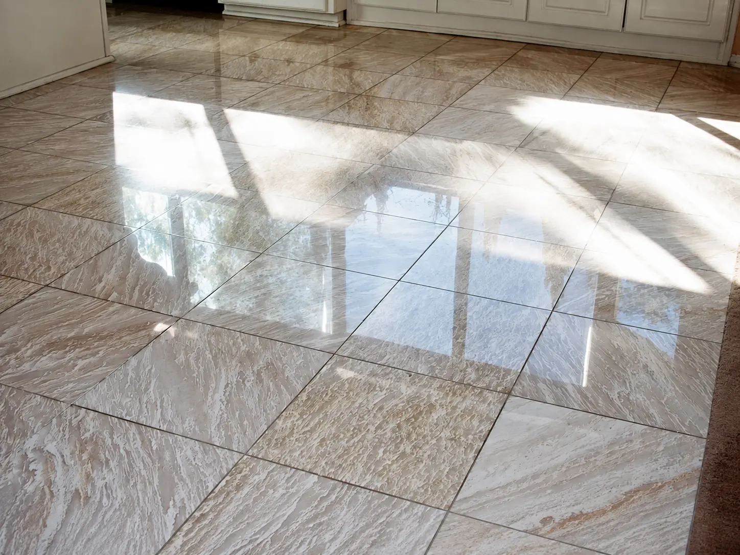 Grey veined marble floor with restored clarity and an even reflective finish