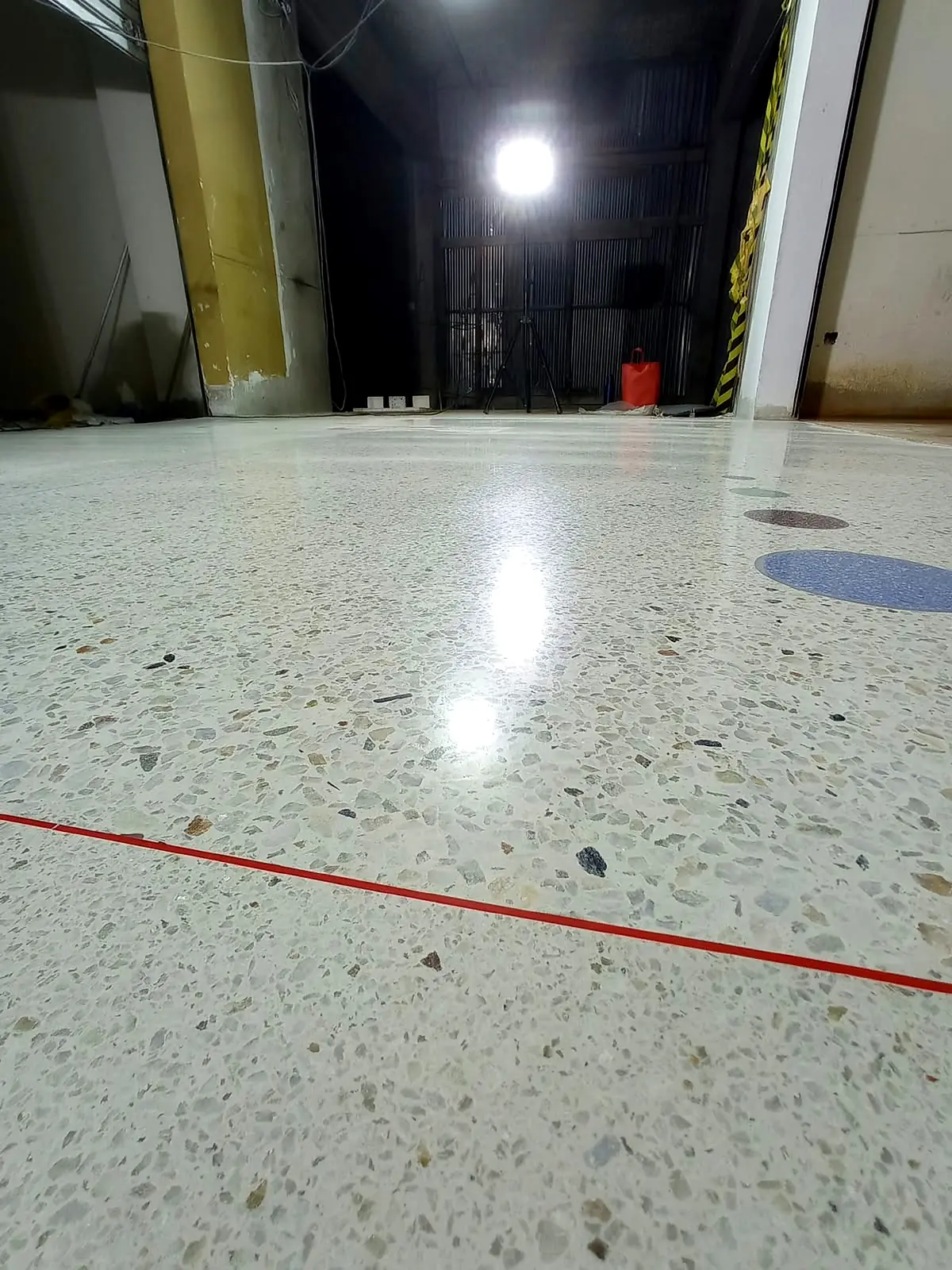 Close view of fine aggregate terrazzo with colour bands and an even finish
