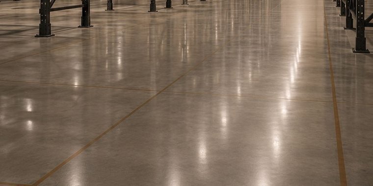 Polished concrete floor in a high-bay logistics warehouse